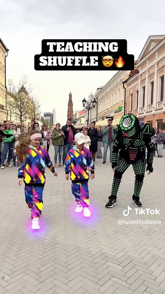 Tuzelity Teaches Shuffle Dance in Neon Mode