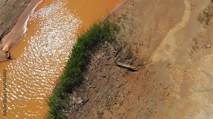 Apocalyptic fantastic background, aerial video. Global worming concept - dry soil, drought, desert landscape, red water. Post-apocalyptic view. Man-made disasters. Natural catastrophes.