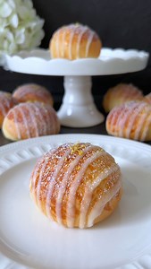 Click here for the Recipe 🤍 Lemon Brioche These light and fluffy brioches with a refreshing lemon glaze are perfect for a cozy breakfast or a sweet afternoon treat. 🥰 📝 Ingredients: For the Dough: - 250 g all-purpose flour - 50 g sugar - 1/2 tsp salt - 1 tsp dry yeast - 100 ml warm milk - 1 egg (room temperature) - 50 g soft butter - Zest of 1 organic lemon For the Lemon Glaze: - 100 g powdered sugar - 2-3 tbsp freshly squeezed lemon juice - Optional: additional lemon zest 🤍 Instructions: 1.