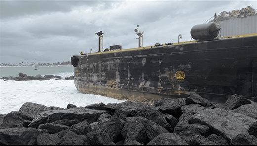 Barge that Delivers Fuel to WAPA Remains on the Rocks in Puerto Rico
