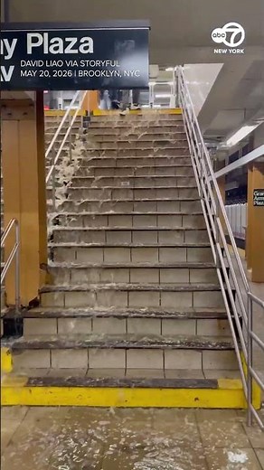 Heavy rain turns NYC subway station stairs in waterfall