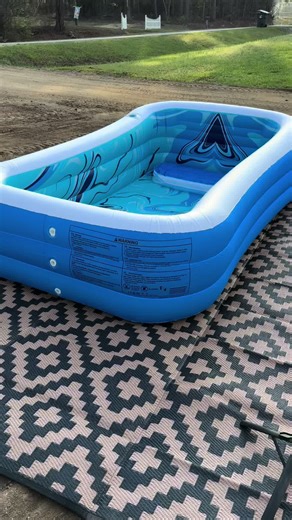 Turn your backyard into the ultimate summer hangout with this oversized inflatable family pool with built-in backrest and seat. ☀️ Designed for both kids and adults, this large blow-up pool provides plenty of space for the whole family to relax, cool off, and enjoy sunny days together. The comfortable built-in backrest and bench seat make it perfect for lounging while the kids splash and play. Made with thick, durable materials and multiple air chambers for added stability, this heavy-duty infla
