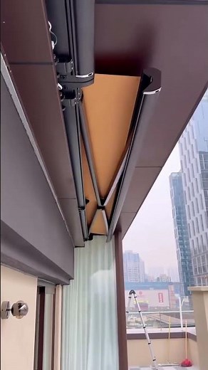 Motorized Retractable Awning Installation for Rooftop Terrace Shade