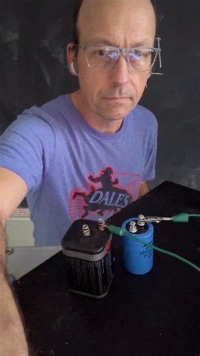 #physicsquestion part 1. What will happen to the brightness of this bulb in series with a capacitor? #physics #physicsteacher #circuits | Rhett Allain