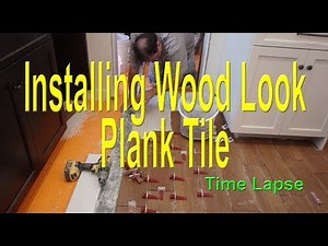 Wood look plank tile installation on Schluter Ditra start to finish time lapse