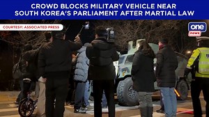 6.8K views · 43 reactions | People were seen surrounding and blocking a military vehicle near South Korea's parliament late Tuesday night after President Yoon Suk Yeol declared martial law. Less than three hours later, parliament voided the declaration, with Speaker Woo Won Shik affirming lawmakers would “protect democracy with the people.” | ONE News | Facebook
