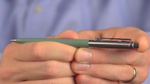 How do retractable ballpoint pens work?