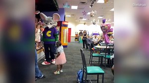 Chuck E. Cheese mascot ignores high-five attempts from black child