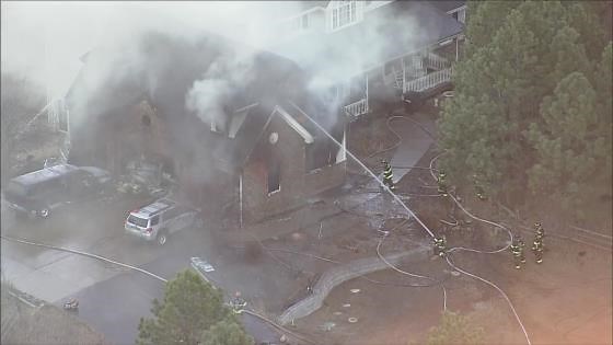 Colorado firefighters rush to put out garage fire that spread to home in Franktown