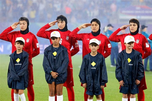 Iran women’s team signals SOS after anthem protest