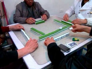 Men playing mahjong in Huangyan China
