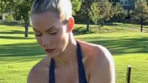 Paige Spiranac fans 'suddenly into golf' after slow-mo swing in plunging top