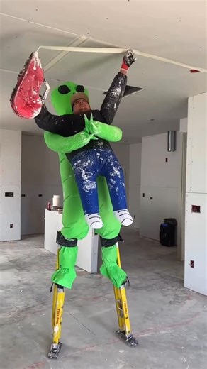 MODERN ARCHITECT on Instagram: "When the client says they want an “out of this world” finish on the ceiling. 👽🏗️ We often talk about the design process, but we have to appreciate the craftsmanship (and sense of humor) that goes into the construction phase. Mastering drywall stilts is hard enough, but doing it mid abduction is next level coordination! By @fuentescardio3 💫 Tag a coworker who needs this suit for the next site visit. 👇 #construction #drywall #craftsmanship #ModernArchitect #USA"