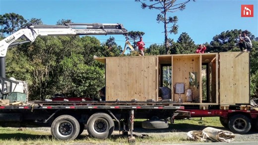 A beautiful prefab cabin inserted in a small forest clearing in southern Brazil