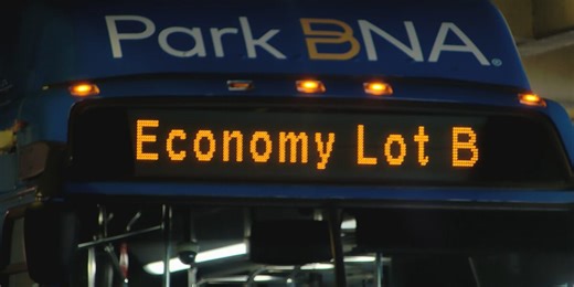 BNA shuttle bus driver arrested on DUI charges for swerving over lanes, driving over median