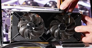 8 pin wires are inserted into the video card by hand. High quality 4k footage of connection