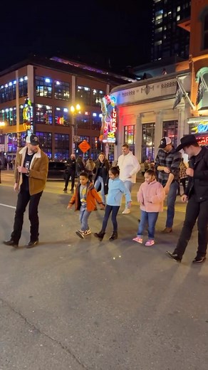 These kids wanted to learn a line dance when they saw us on Broadway 🤠 They caught on quick and had a fun time learning something new! Learn how to line dance on urbancowboynashville.com 🎉 #linedancing #nashvilletn #nashvilletennessee #nash #urbancowboylinedancing #christmastime | Urban Cowboy Line Dancing