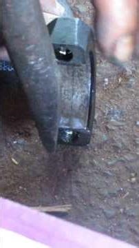 Dad adapting the bearing housing of a 1980 Belina.