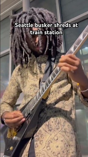 Seattle busker shreds at train station