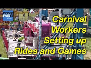 Carnival Workers setting up Rides and Games