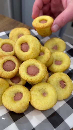 Mini corn dog bites are easy to make and so good! #marthawhitepartner Recipe 1 package Martha White Honey Cornbread and Muffin Mix milk, egg, oil 4 Hotdogs cut into 6 pieces each Steps -Mix cornbread mix following directions on the package. -Cut hot dogs into 6 pieces each. -Pour cornbread into mini muffin pan filling about half way full. -Place a hot dog piece into each muffin. -Bake at 400 degrees for 12-15 minutes. Enjoy! #corndogs #cornbread #recipe #easyrecipes #cornbreadmix #snacks