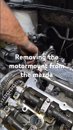 Mazda. timing chain repair remove the Motor mount