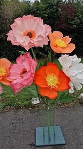 1.5K reactions · 165 shares | Butterfly ranunculus and poppy flowers #giantpaperflowers #crepepaperflowers #handmadeuk | Grand Flora Uk | Facebook