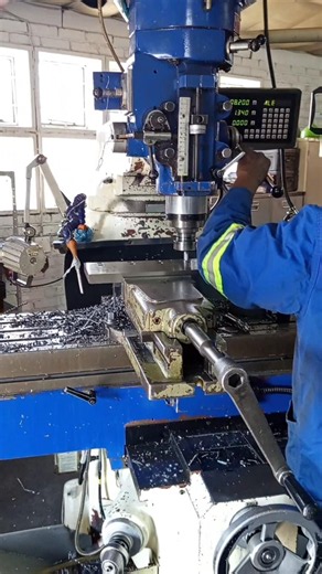 DRILLING THROUGH MILD STEEL THICK PLATE USING UNIVERSAL MACHINE IN MECHANICAL WORKSHOP