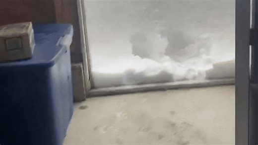 Erie County resident opens door to find backyard buried under more than two feet of snow
