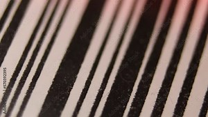Close Up macro barocde scanning. Bar code reader. scanline is red while reading