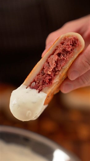 Recipe (Printable version on pattyplates.com) Yields 6 hot pockets Corned Beef 650 g corned beef (2 cans) 4 cloves garlic, minced 1 red onion, diced 1/2 tsp black pepper, ground Hot Pocket Dough 300 g all-purpose flour 4 g baking powder 5 g salt 2 g garlic powder 310 g 0% greek yogurt In a pan over medium heat, add the corned beef and cook until the fat has rendered. Add the garlic, red onion, and black pepper and cook until translucent. Remove from the heat and set aside. In a bowl, combine the