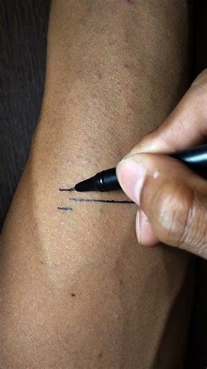 Batman logo tattoo design with gel pen