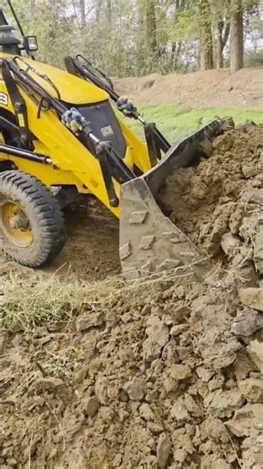 my JCB working in grass field#viral #automobile #jcbbaba #trending #ytshots #shortsfeed #punjabi #yt