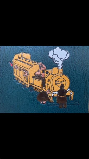 Railway Ribaldry illustrated by W. Heath Robinson. Bound in leather with leather onlays and black embossing. Wonderful Marbled endpapers. #blackcatbindery #bookbinding #handmade #marbledpaper #madeinsomerset #heathrobinson | Black Cat Bindery