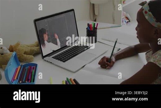 Teacher drawing graphs on laptop, child using pencil following lesson and writing as overlays grow. Remote, learning, education, instructor, student, screen, study Stock Video Footage - Alamy
