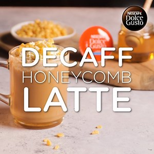 Decaf HoneyComb Latte Recipe: Enjoy a Decaf HoneyComb Latte! 🧋​🐝​ Sip slowly and savor the delicious combination of decaf coffee, honey, and creamy toppings 👍​ Ingredients: 1 NESCAFÉ Dolce Gusto Decaf pod 1 cup of milk (dairy or a non-dairy alternative) Honey (to taste) Whipped cream Crushed almonds (for topping) 👉 Brew NESCAFÉ Dolce Gusto Decaf 👉 Heat the milk in a separate container or use the Dolce Gusto milk frother if available. Froth the milk until it reaches your desired level of cre