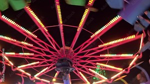 Ferris wheel at amusement park in the night