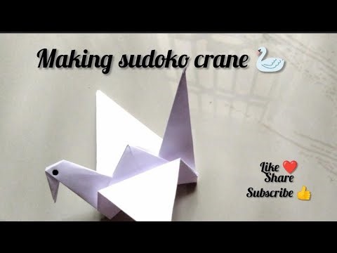 Learn how to make a stunning origami crane step-by-step 💫 EasyOrigYouTube#CraftIdeasSimpleOrigami