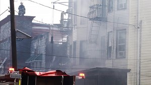 Four-alarm Passaic blaze engulfs two buildings and displaces 40 residents
