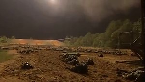 The Night Infiltration Course (NIC) : is a training exercise where Trainees must low crawl or high crawl for 100 meters under direct fire of machine guns. In this video, the flairs illuminate the course prompting them to stop moving, once it is dark again they resume movement. | 3rd Battalion 13th Infantry Regiment BCT