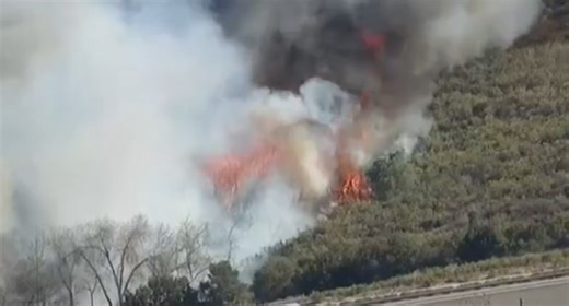 Evacuations lifted after crews douse brush fire near homes in Poway