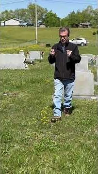 Using dowsing rods to find a grave #