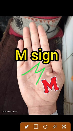 Unlock the Secrets of M Sign on Your Palm
