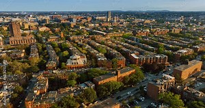 Rows of blocks of flats in the residential area of Boston. View of rooftops and streets from top.