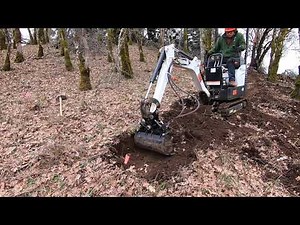 Bobcat 418 (current model: E10) w/ Tilt Bucket: Trail Building