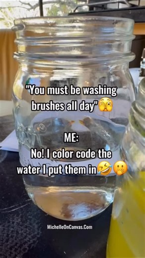 Michelle Scarafile Wallace on Instagram: "One of my favorite artist hacks… People always assume I’m over here scrubbing brushes like Cinderella in the art studio.😂 Meanwhile… absolutely not.🤦🏼‍♀️ I’m color-coding my paint water like a whole chaotic Monet-inspired scientist. Blue brushes go in blue water. Orange brushes in orange water. Does this make me feel like a genius? Yes. Does it keep me from creating muddy colors? Also yes. Does it mean I avoid washing brushes for way longer than I sho