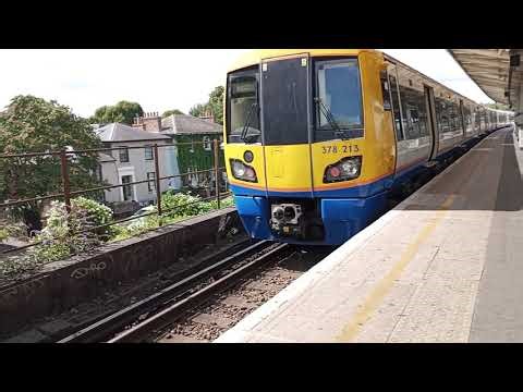 Class 378London Overground approaching and departing Peckham Rye railway station, London