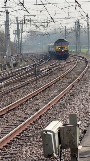 Class 47 810 Crewe Diesel Depot passing Winwick Junction