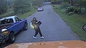 'He just didn't care': Video shows girl's frightening brush with truck running school bus stop sign