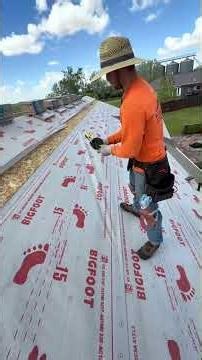 Rolling out synthetic felt boom #bluecollar #bluecollarboys #bluecollarlife #construction #roofing